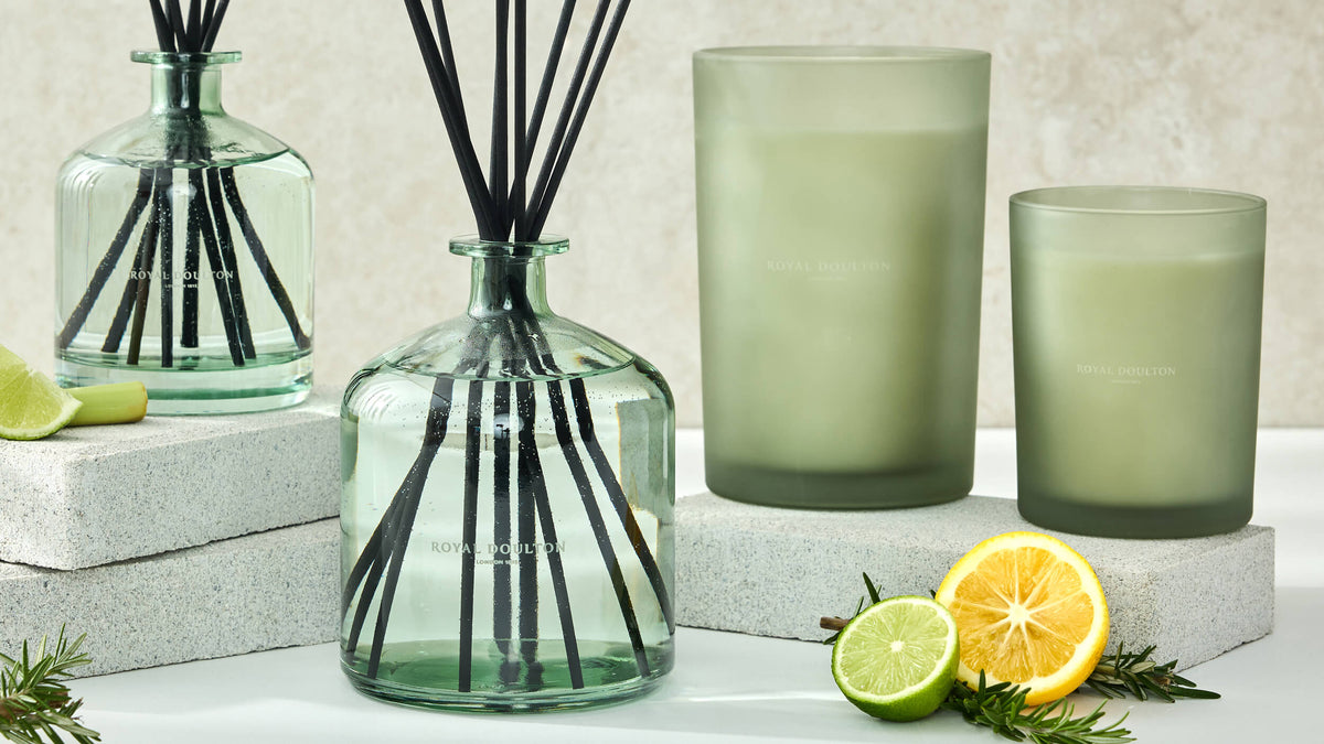 Royal Doulton Ashbourne green glass diffusers and candles with citrus fruit