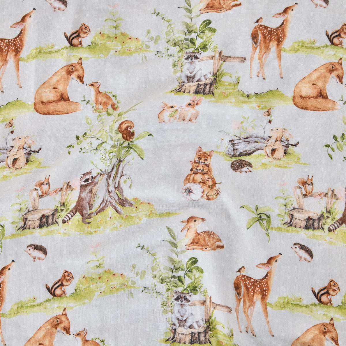 Twill & Co Woodland nursery print with deer, foxes, rabbits and owls among trees