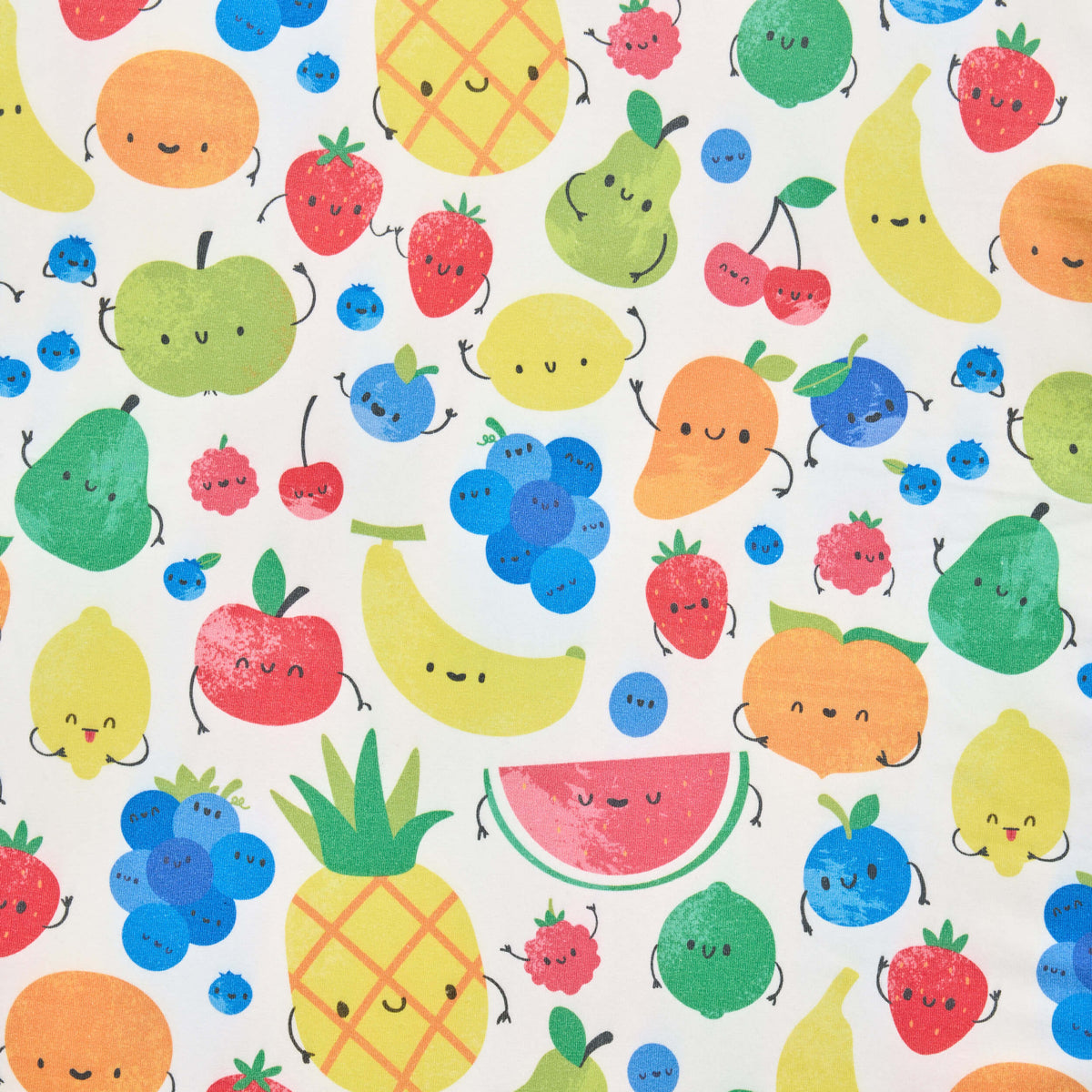 Colourful smiling fruit on white Twill & Co nursery fabric, including pineapples, berries and pears