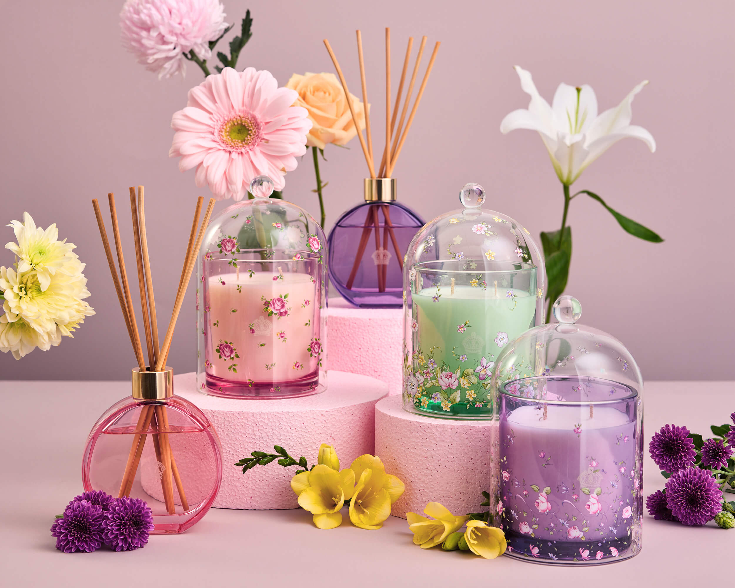 Royal Albert home fragrance candles and diffusers in pink, purple and green floral glass