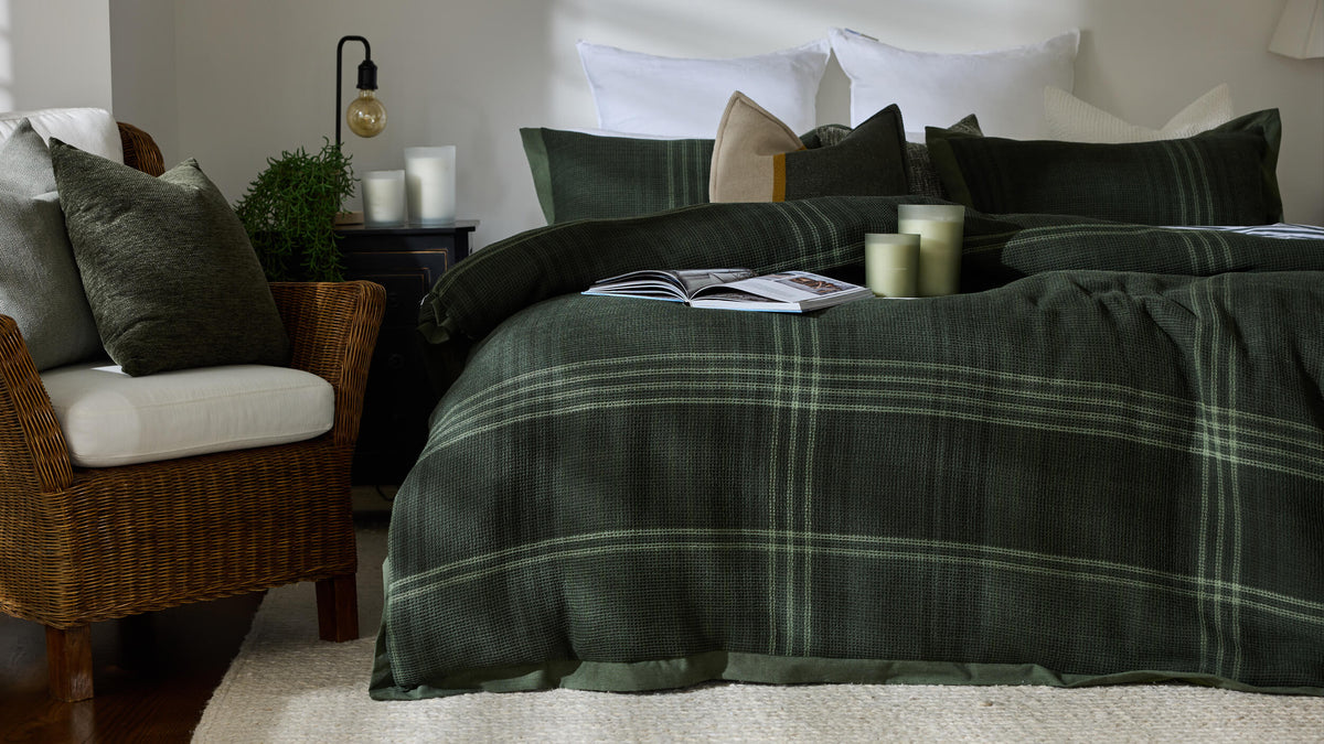 Royal Doulton Hampshire duvet cover styled on a bed with coordinating cushions