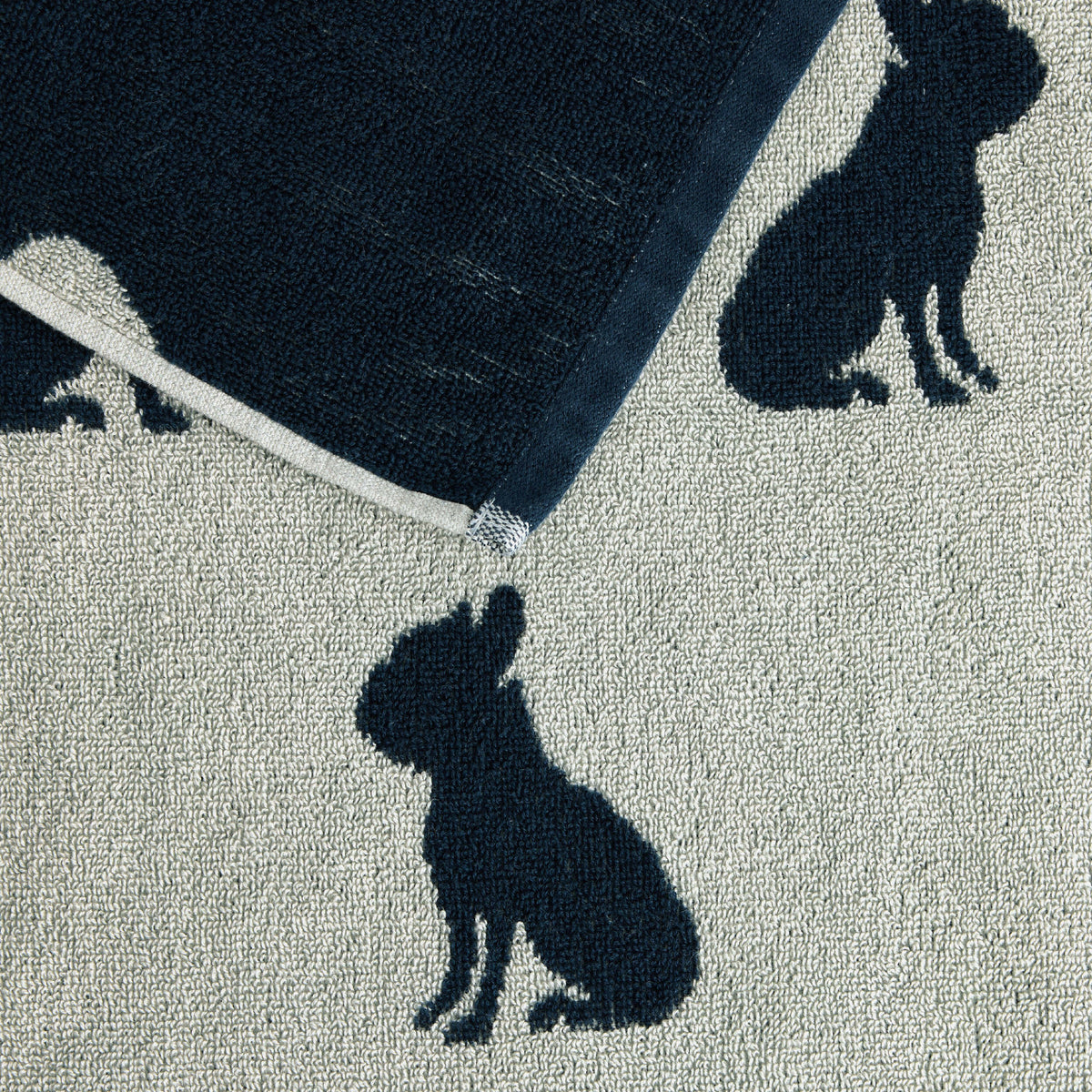 Charcoal and pale grey Twill & Co dog towel showing its border and woven dog silhouettes