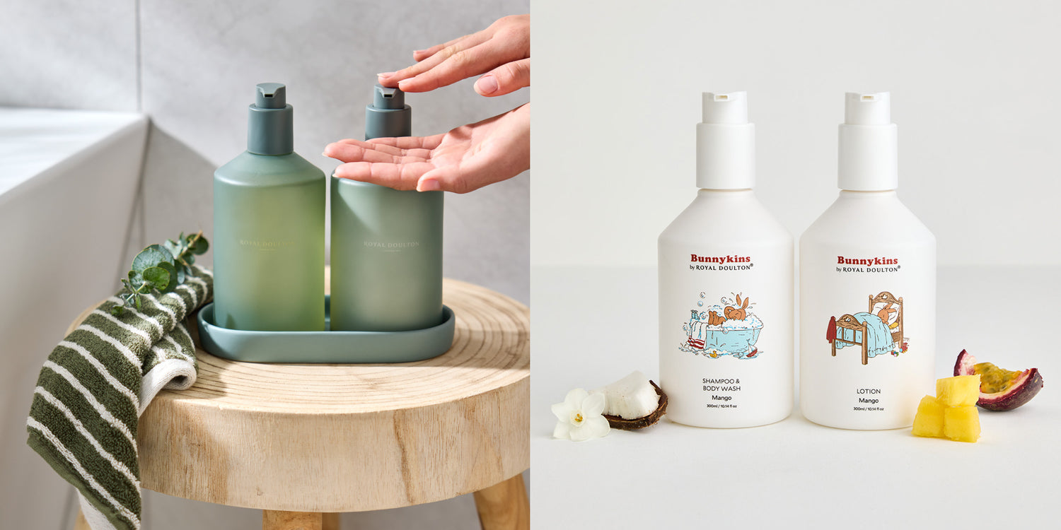 Green Royal Doulton body care bottles beside white Bunnykins shampoo, body wash and lotion bottles
